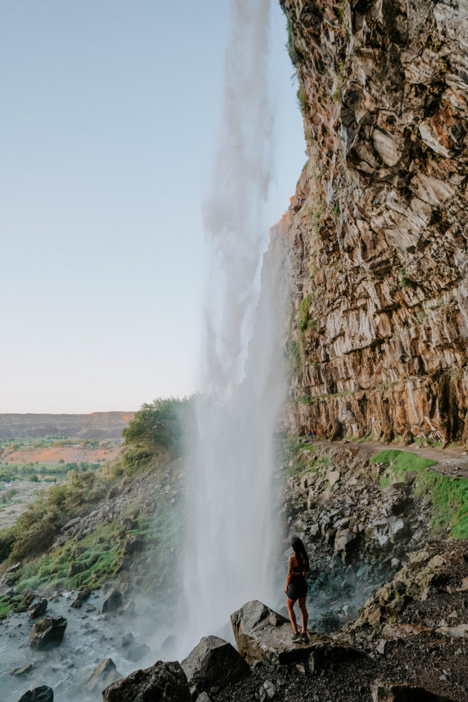 Standing behind Perrine Coulee Falls in Twin Falls Idaho