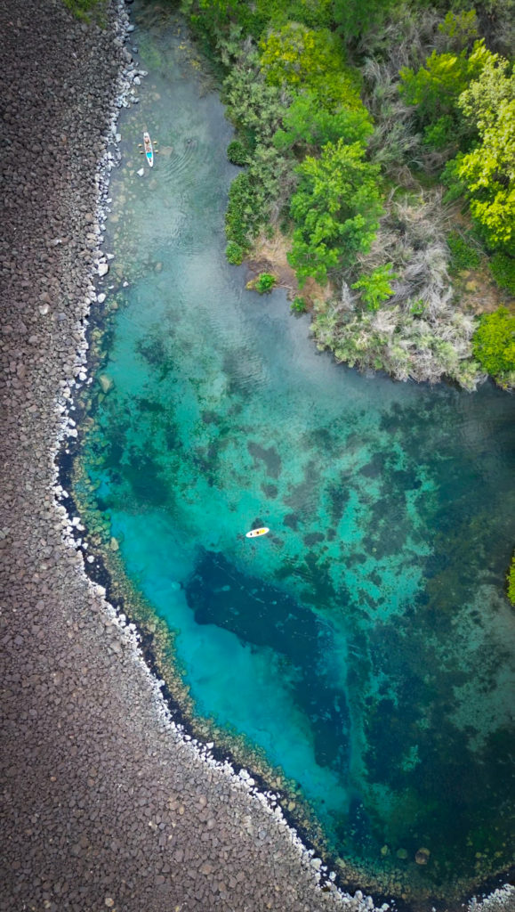 Aerial shot of clear blue water in Blue Heart Springs in Twin Falls