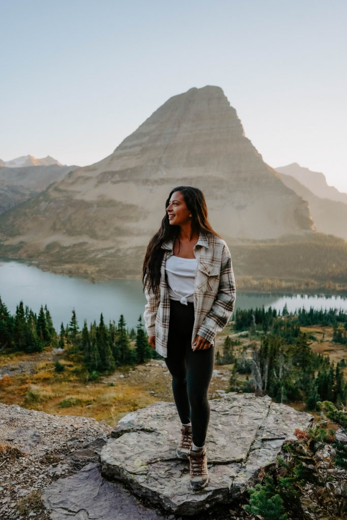 Standing in front of a lake and mountain in Glacier National Park