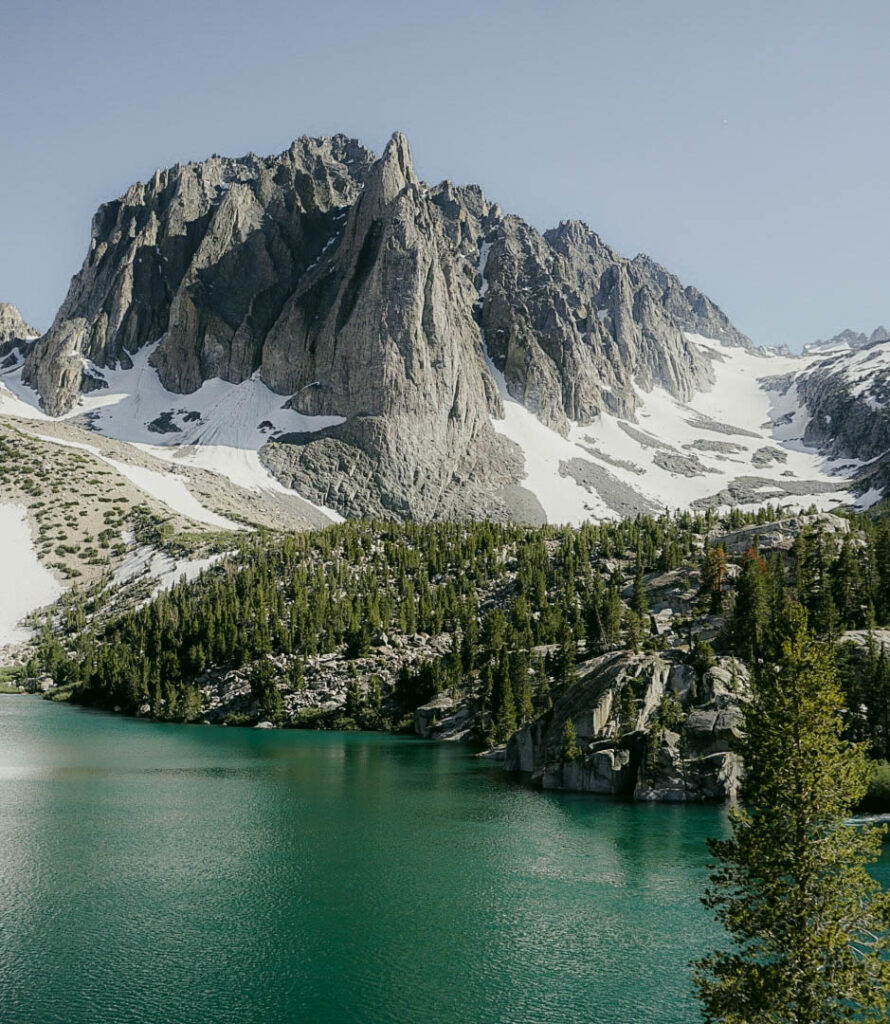 Jagged mountain with snow and lake in Big Pine California