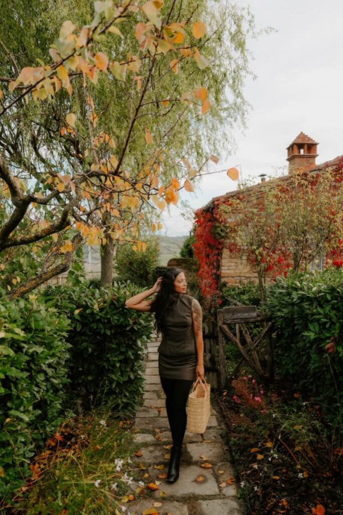 girl standing in front of a house in italy