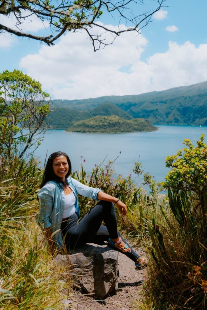 girl sitting in front of ecuador otavalo lake