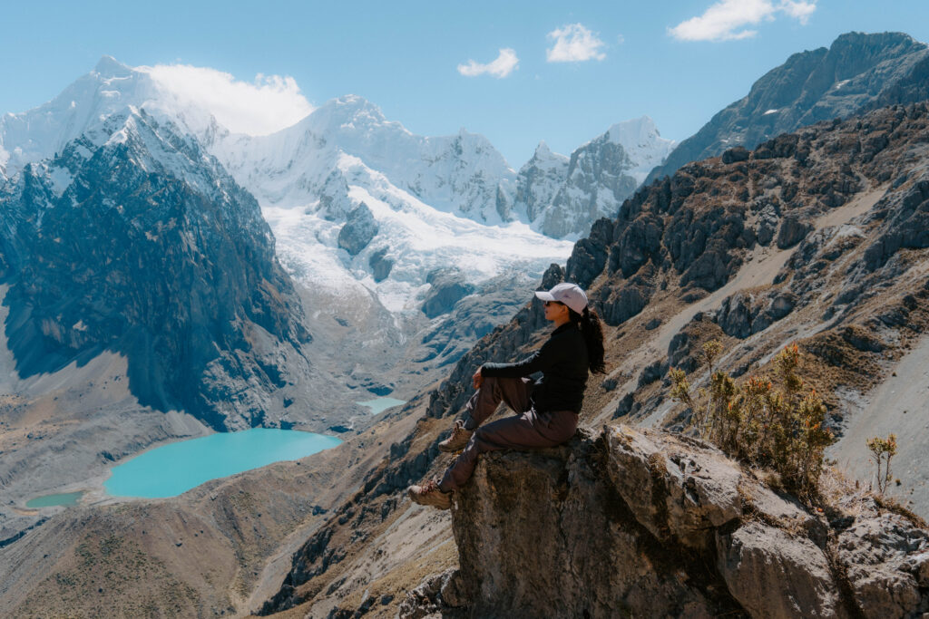 Sitting in front of Siula Grande on the Cordillera Huayhuash
